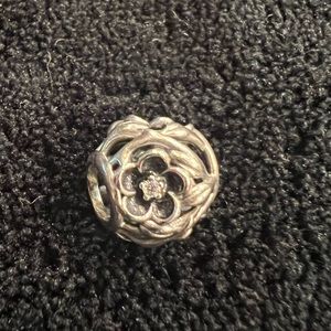 Pandora flower charm with center stone